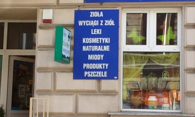powiększ